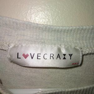 White lovecrazy long sleeve sweater/shirt great condition